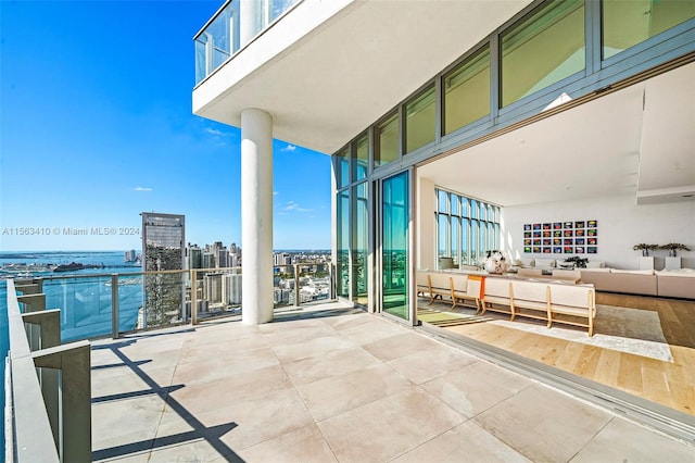 balcony featuring a water view