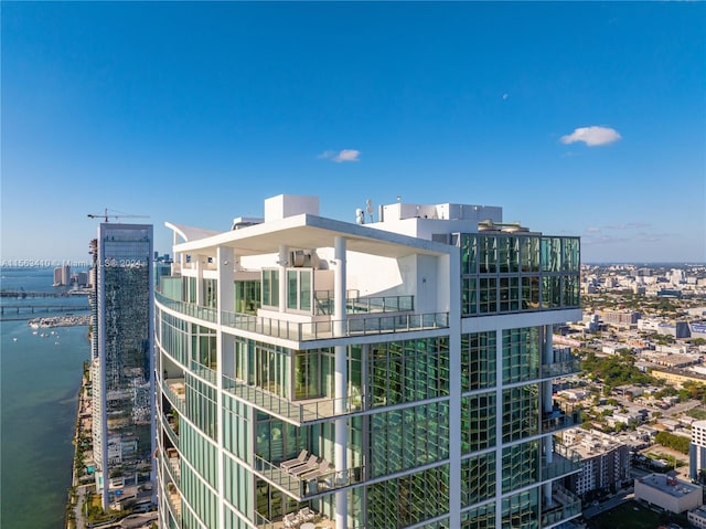 view of building exterior with a water view