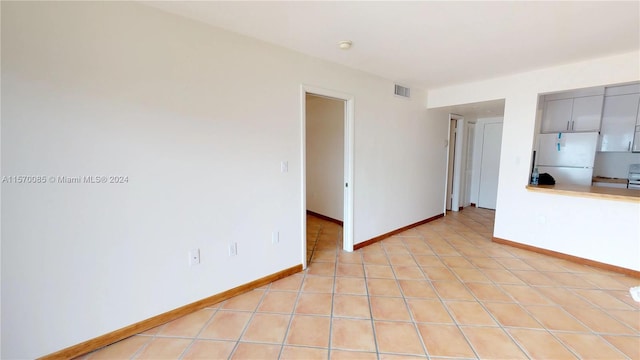 view of tiled spare room