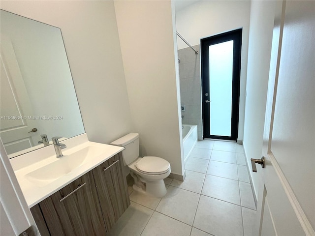 full bathroom featuring tiled shower / bath combo, vanity, toilet, and tile flooring