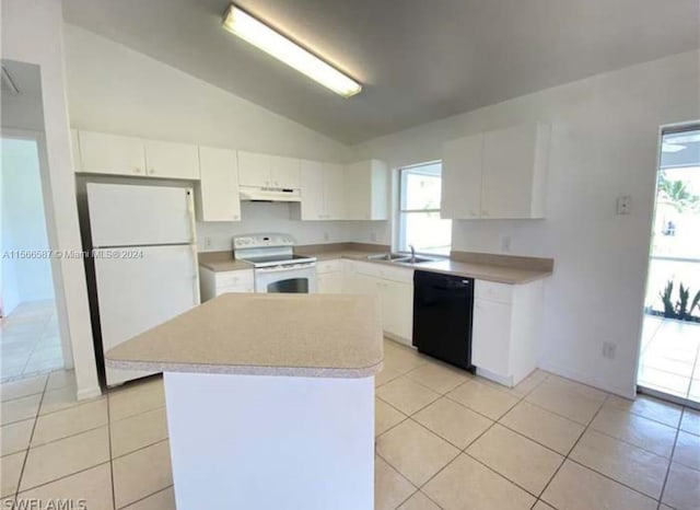 kitchen featuring white cabinets, white appliances, vaulted ceiling, and light tile floors