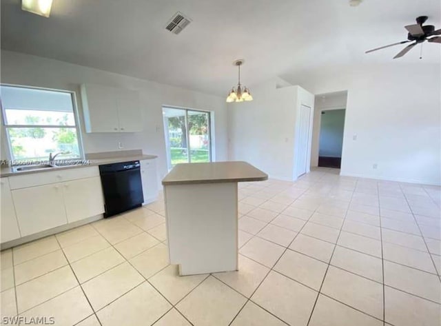 kitchen featuring black dishwasher, white cabinets, light tile flooring, ceiling fan with notable chandelier, and sink