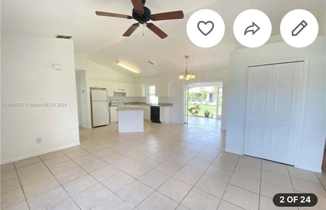 interior space featuring lofted ceiling, ceiling fan with notable chandelier, and light tile flooring