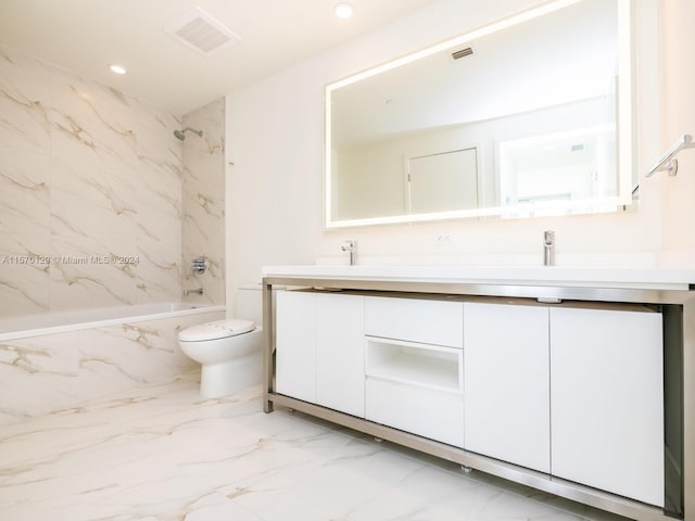 full bathroom with toilet, tile floors, dual bowl vanity, and tiled shower / bath combo