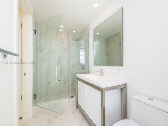 bathroom featuring walk in shower, tile floors, toilet, and oversized vanity