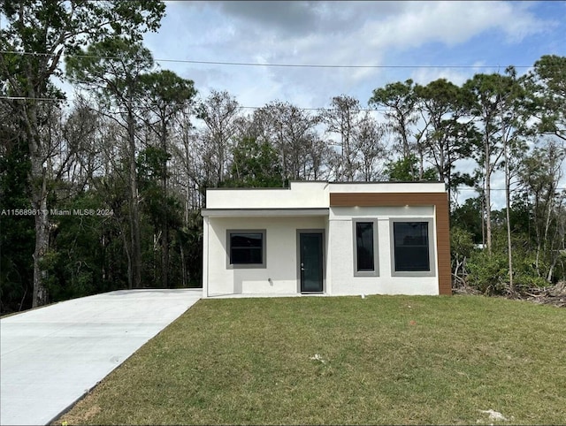 view of shed / structure with a lawn