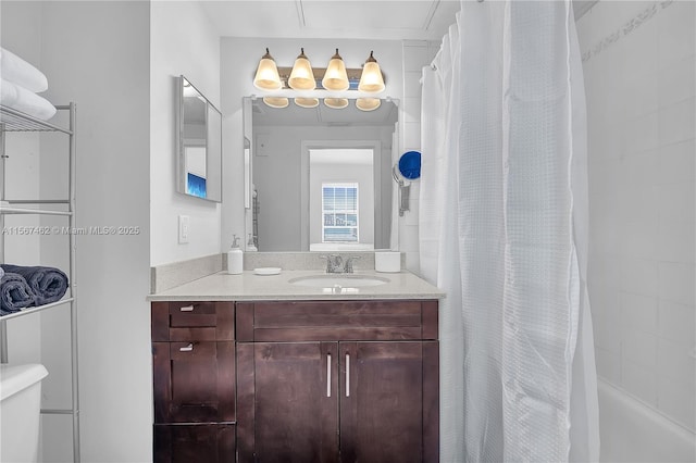 full bathroom featuring vanity, toilet, and shower / tub combo with curtain