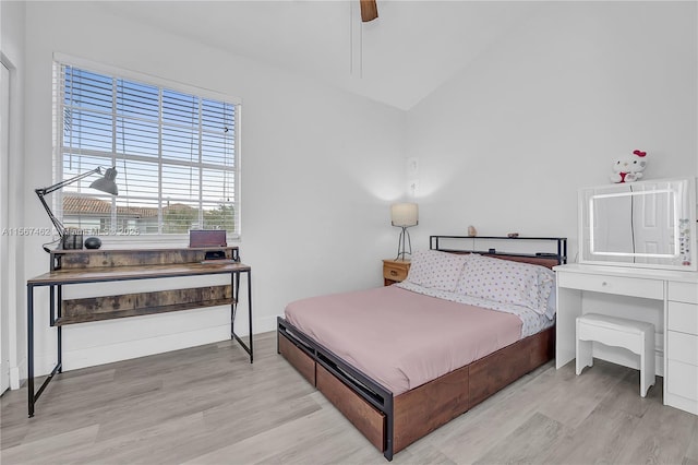 bedroom with light wood-type flooring and ceiling fan