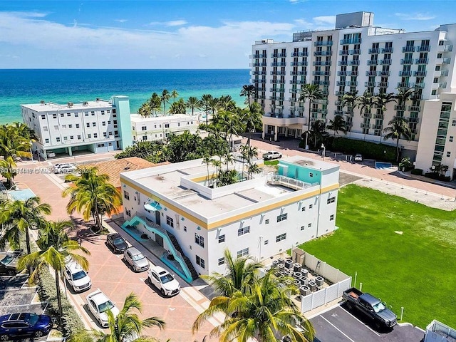 drone / aerial view with a water view