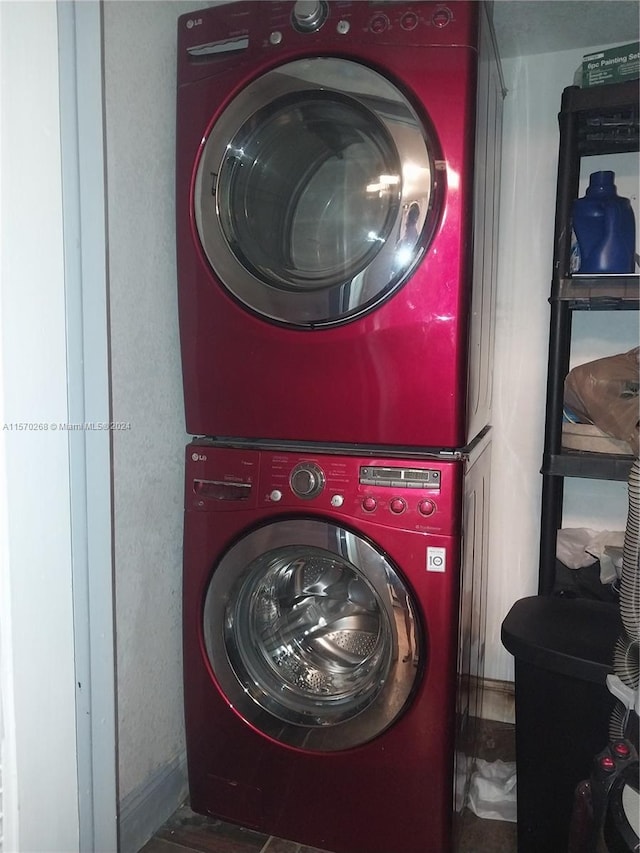 laundry area featuring stacked washer and dryer