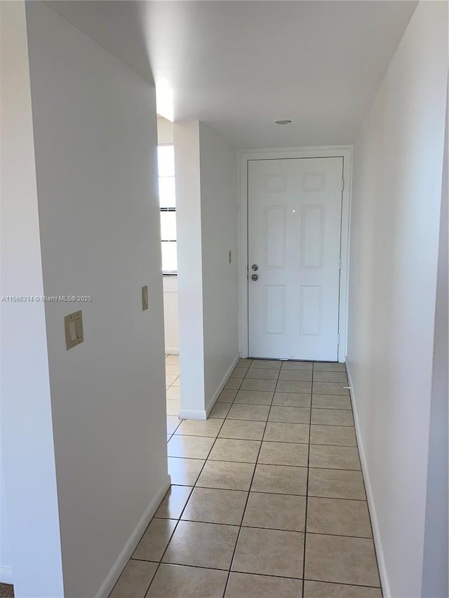 unfurnished room with a ceiling fan, baseboards, carpet floors, and a textured ceiling