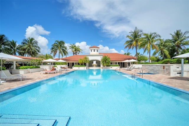 view of swimming pool featuring a patio