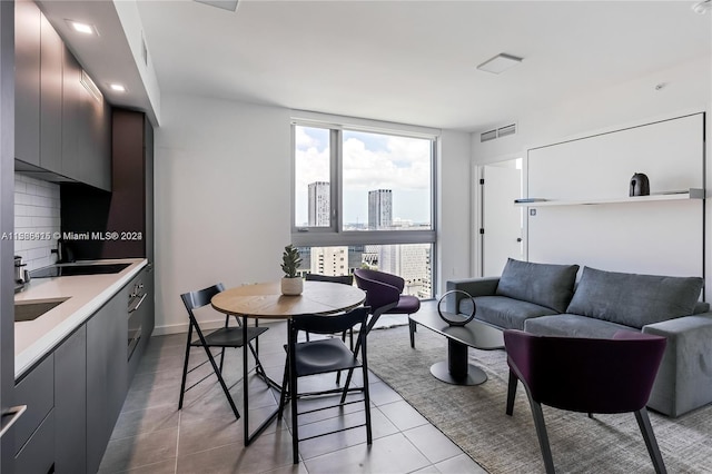 interior space featuring light tile flooring