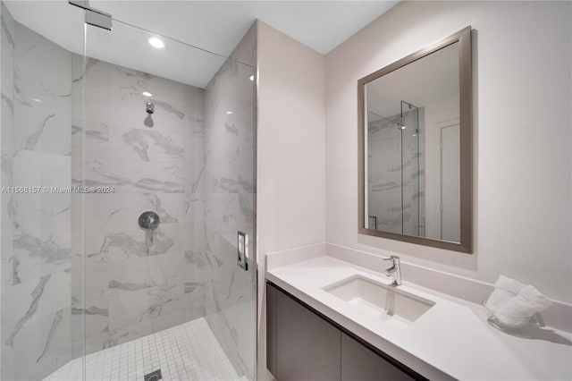 bathroom featuring vanity and walk in shower