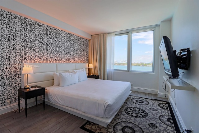 bedroom featuring hardwood / wood-style flooring