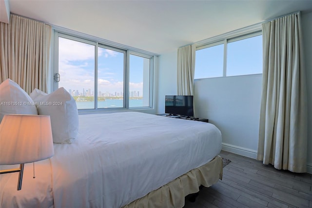 bedroom with hardwood / wood-style flooring