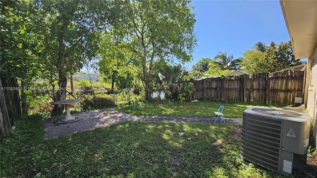 view of yard featuring central AC