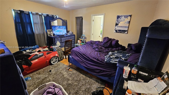 bedroom with a textured ceiling