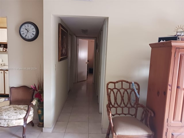 hallway with light tile floors