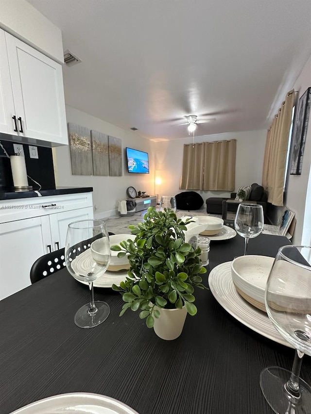 dining area featuring ceiling fan