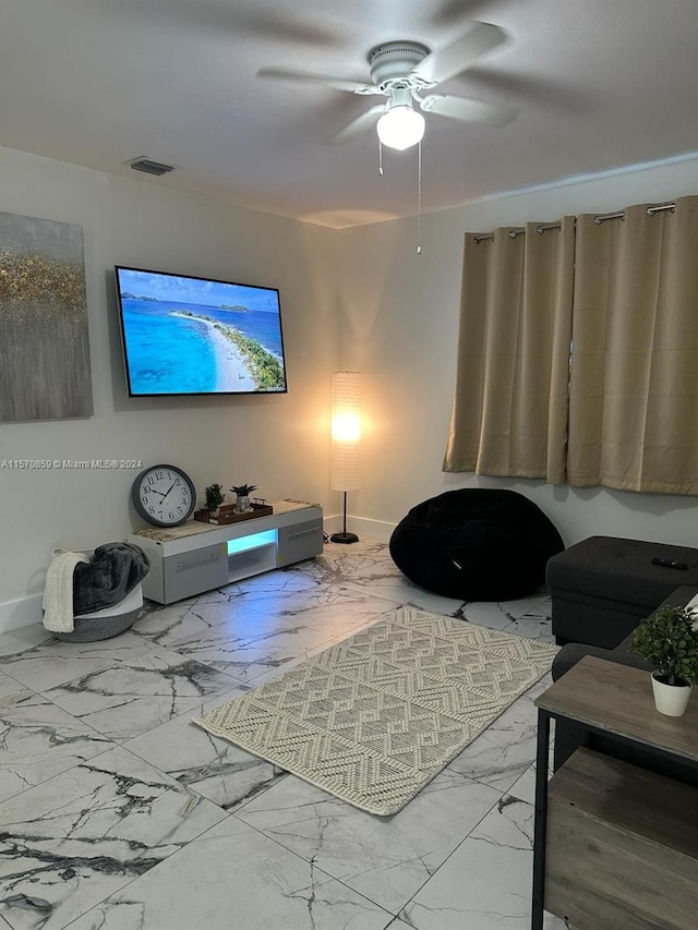 living room featuring ceiling fan