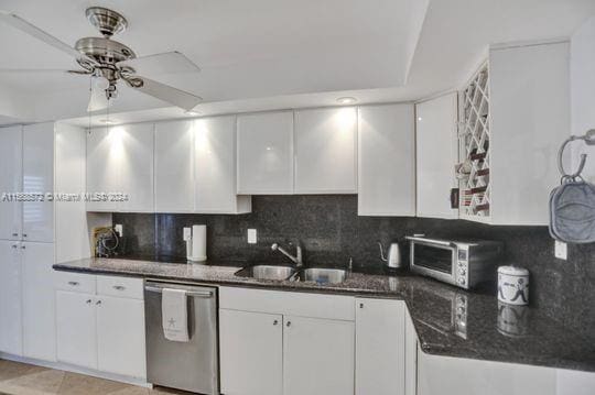 1121 Crandon Blvd Unit F906, Key Biscayne, FL 33149 - kitchen with white cabinets, ceiling fan, dishwasher, and a sink