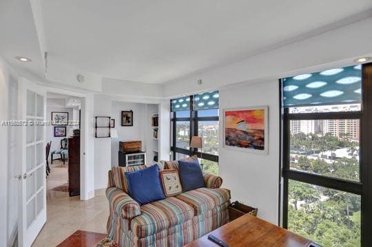 1121 Crandon Blvd Unit F906, Key Biscayne, FL 33149 - living area with french doors