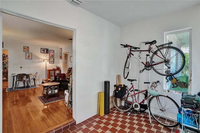 misc room with dark tile flooring