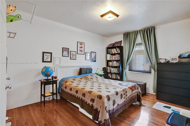 bedroom with light wood-type flooring