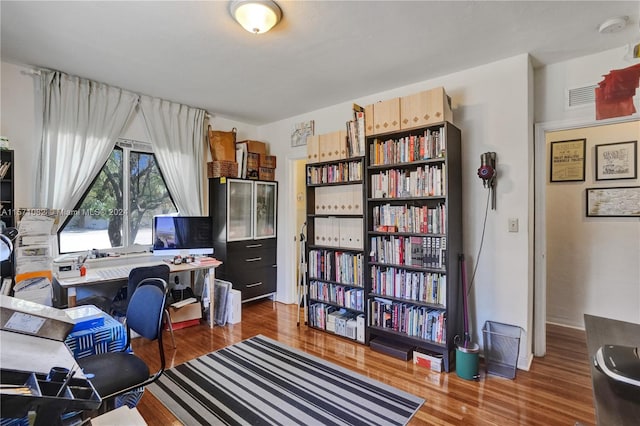 home office featuring dark hardwood / wood-style floors