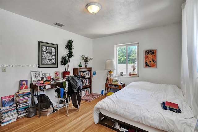 bedroom featuring light hardwood / wood-style flooring