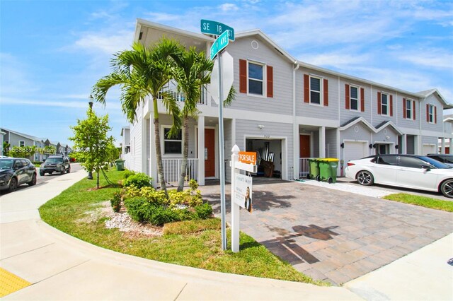 view of front of property featuring a garage