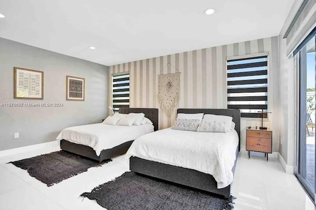 bedroom featuring light tile floors