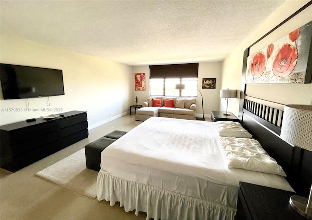 bedroom featuring a textured ceiling