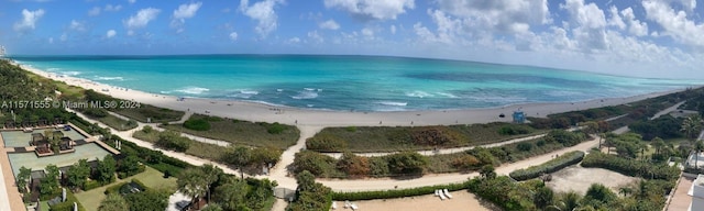 exterior space featuring a view of the beach