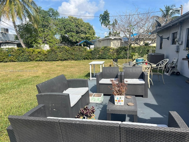 view of patio with outdoor lounge area and central air condition unit