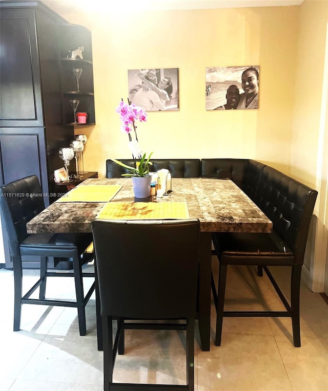 dining room with light tile patterned floors