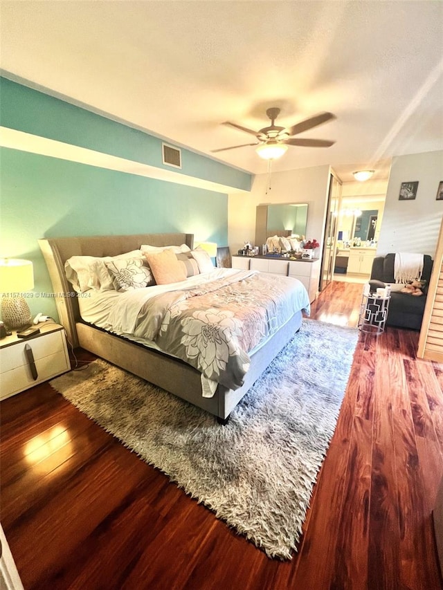 bedroom featuring ceiling fan and hardwood / wood-style floors