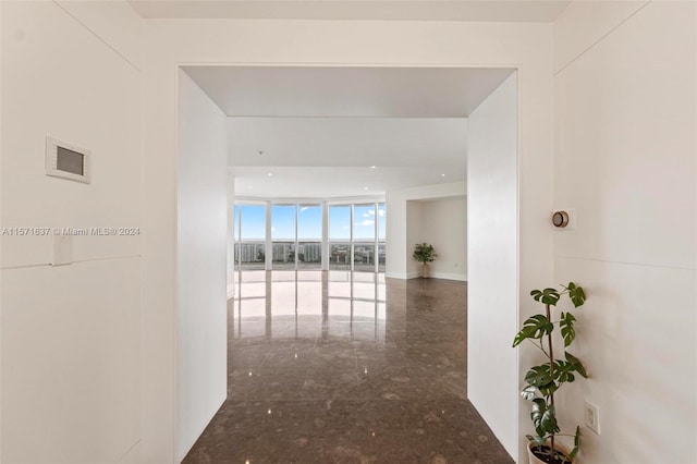 hallway with expansive windows