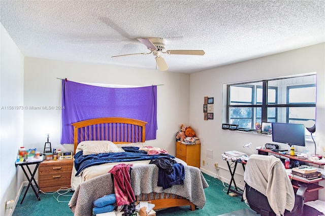 bedroom with carpet flooring, ceiling fan, and a textured ceiling