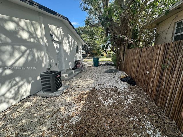 view of yard featuring central AC