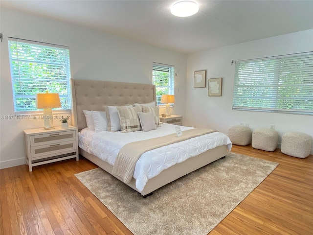 bedroom featuring hardwood / wood-style floors