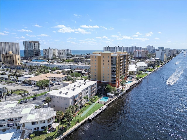 birds eye view of property featuring a water view