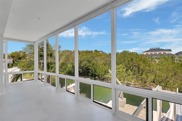 unfurnished sunroom with plenty of natural light