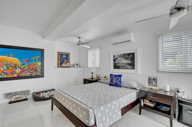 bedroom featuring a wall unit AC and ceiling fan