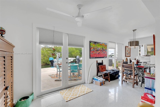 interior space featuring french doors and ceiling fan