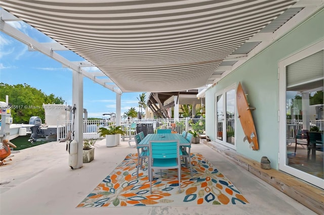 view of patio / terrace with french doors and a pergola