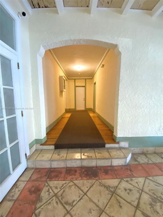 hall with light tile floors