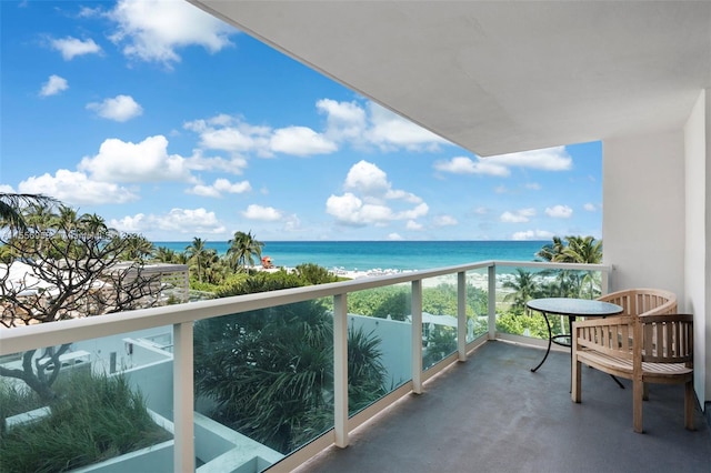 balcony featuring a water view