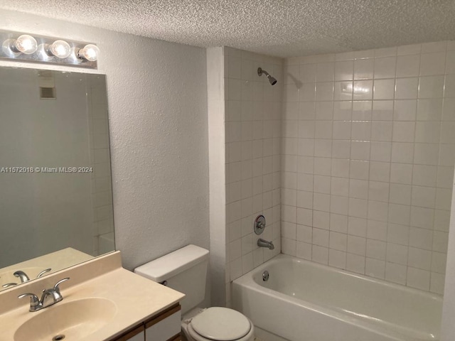 3985 W Mcnab Rd Unit A111, Pompano Beach, FL 33069 - full bath featuring a textured ceiling, a textured wall, toilet, shower / bath combination, and vanity